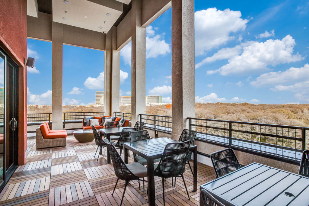 Outdoor seating with tables and chairs and open wide views