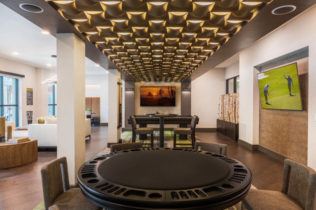 Clubhouse with pool table, flat screen TV, poker table, and decorative ceiling